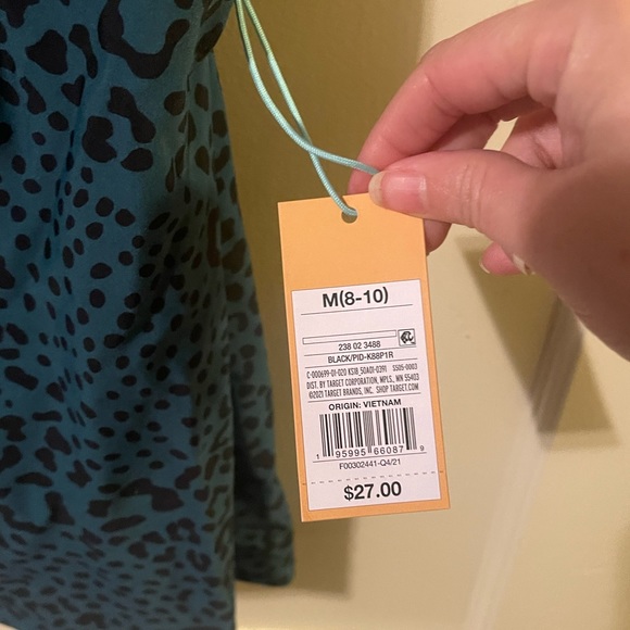 NWT. Kona Sol swim top. Teal with leopard print. Size medium. - Picture 2 of 3